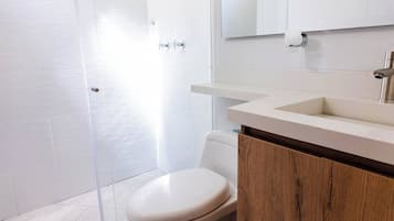 Hair dryer, towels, soap, shampoo