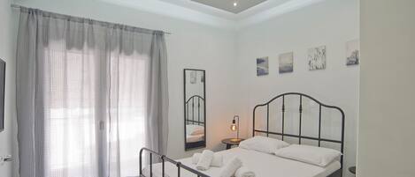 1 غرفة نوم ومكواة/لوح كي وواي فاي وملاءات أسرّة