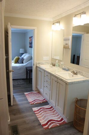 Shower, hair dryer, towels, toilet paper