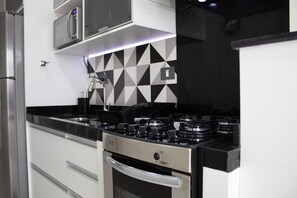 Private kitchen - Flat Unitá Homestay (Praia Grande)
