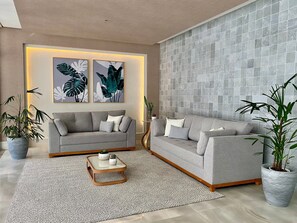 TV - Flat Unitá Homestay (Praia Grande)