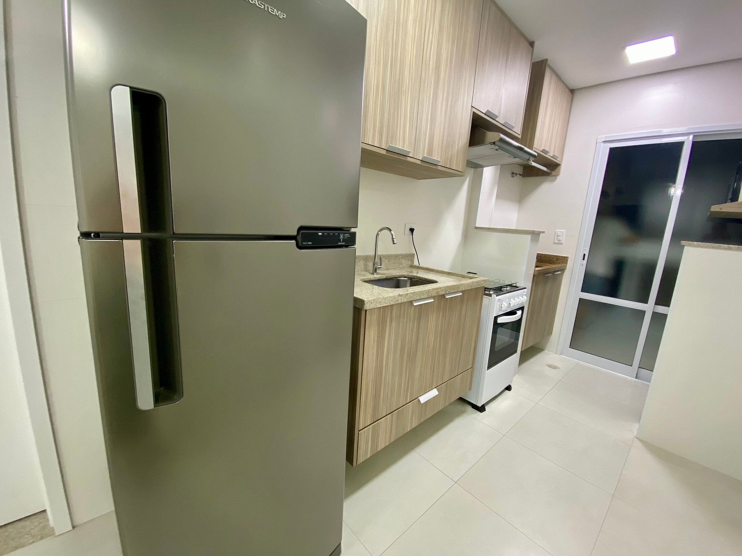 Apartamento Confort | Cocina privada | Frigorífico y utensilios de cocina