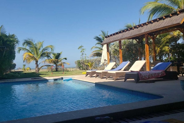 Outdoor pool, pool umbrellas, sun loungers