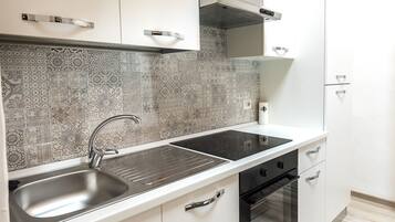 Fridge, oven, dining tables