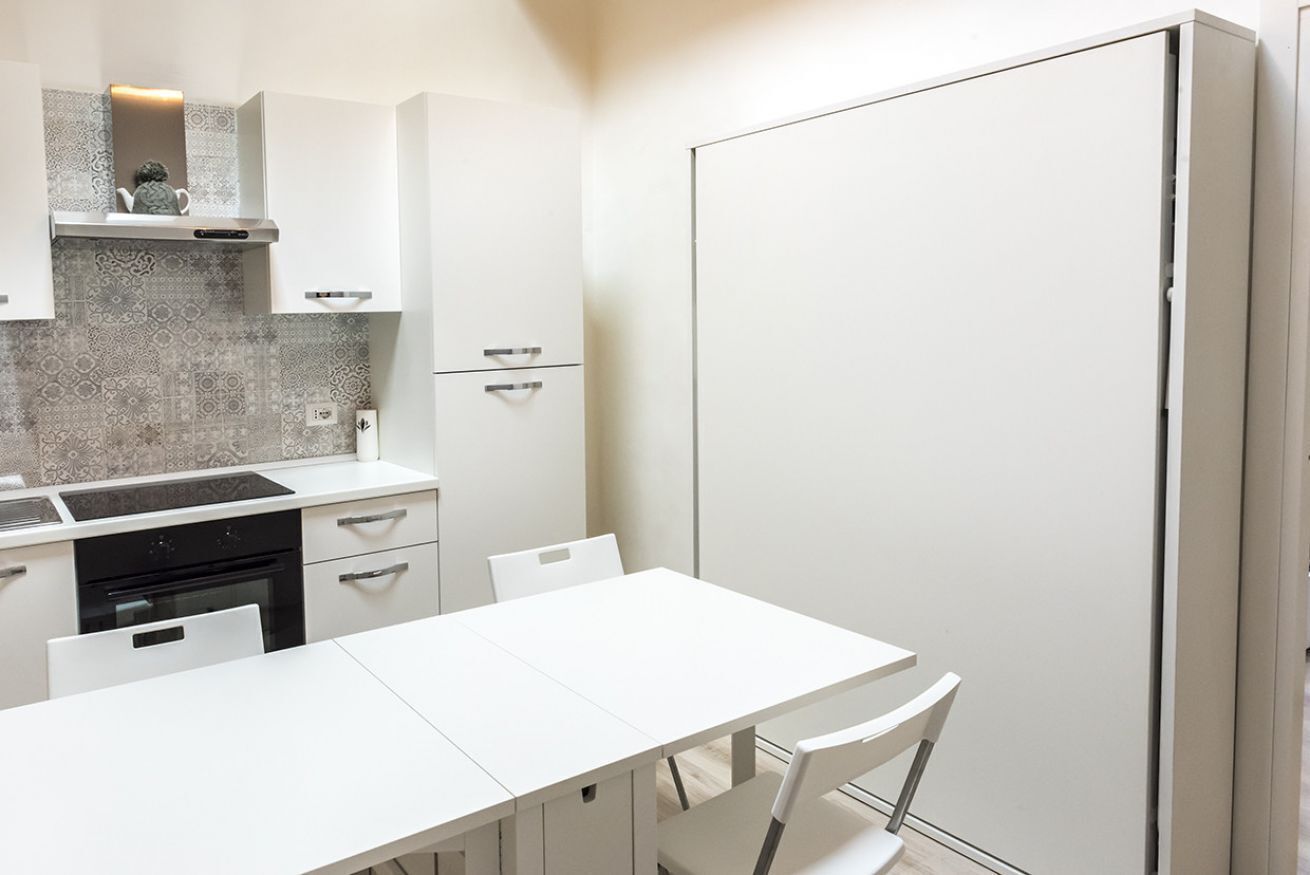 Fridge, oven, dining tables