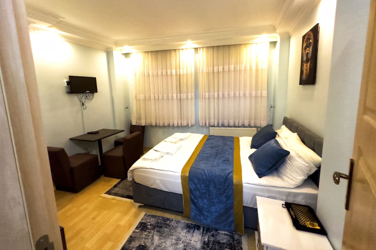 Premium bedding, minibar, desk, laptop workspace