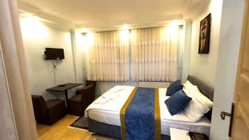 Premium bedding, minibar, desk, laptop workspace