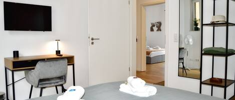 3 bedrooms, desk, iron/ironing board, travel crib