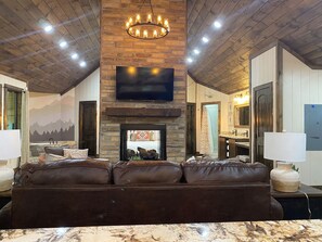 Smart TV, fireplace, books
