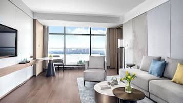 Premium bedding, down comforters, minibar, in-room safe