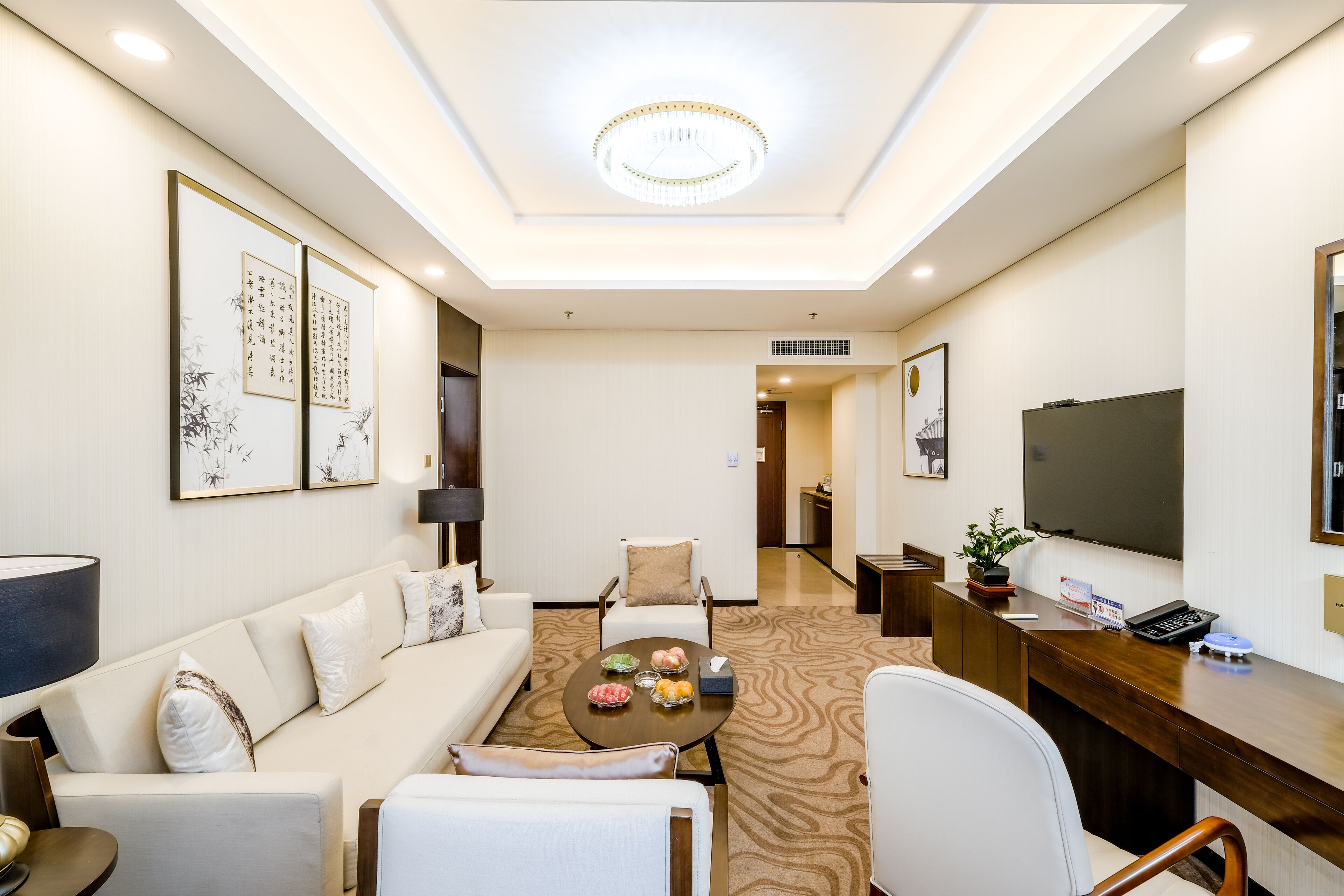 Standard Suite | Living room | 50-inch TV with cable channels