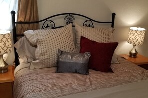 1 habitación, tabla de planchar con plancha, cuna de viaje y wifi