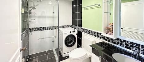 Shower, hair dryer, towels, soap