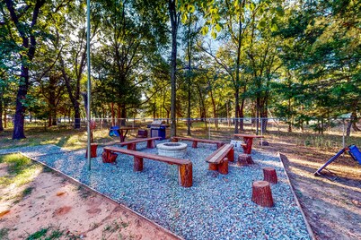 Private gated home on 5 acres near Lake Texoma with dog-friendly yard & firepit