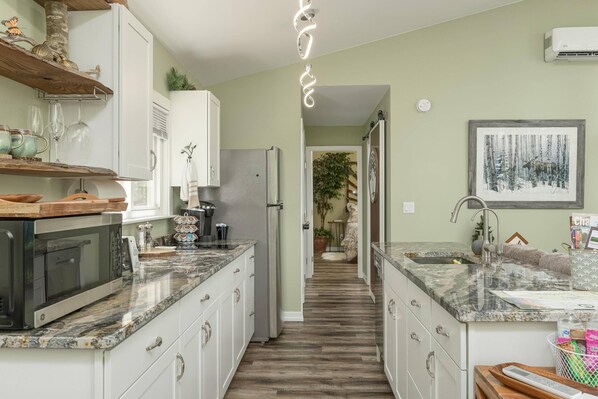 Fridge, microwave, dishwasher, coffee/tea maker