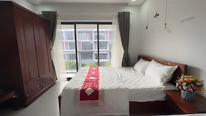 Deluxe Double Room | Minibar, desk, laptop workspace, blackout drapes - Pho Homestay (Phu Quoc)