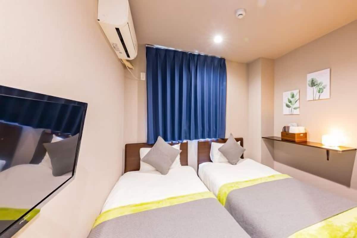 Desk, blackout curtains, free WiFi, bed sheets