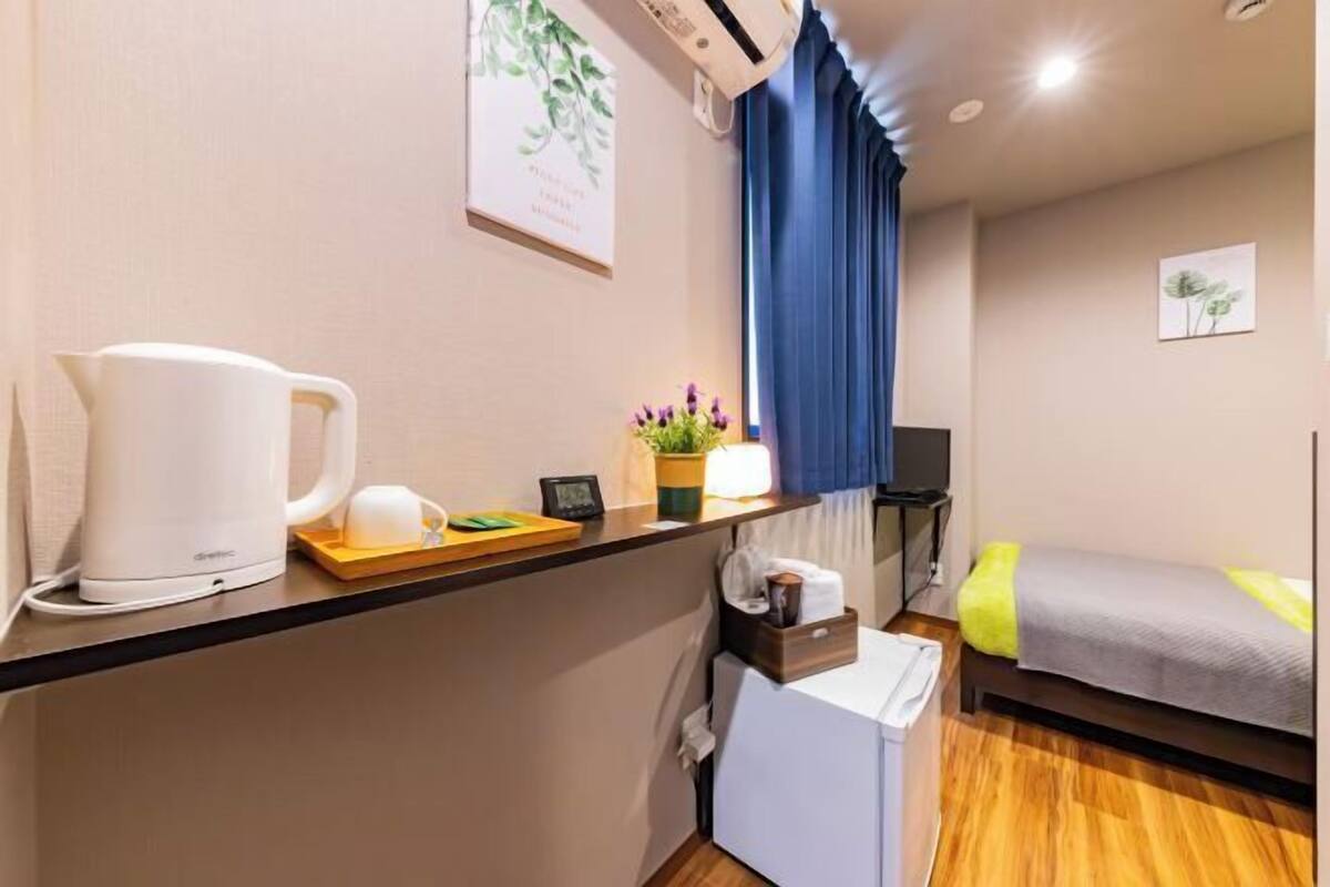 Desk, blackout drapes, WiFi (free), bed sheets