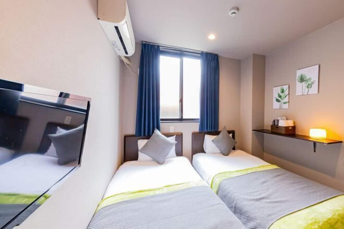Desk, blackout drapes, WiFi (free), bed sheets