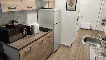 Superior apartman, 2 hálószobával, kilátással a városra | Privát konyha | Mikrohullámú sütő, kávéfőző, elektromos vízforraló és kenyérpirító