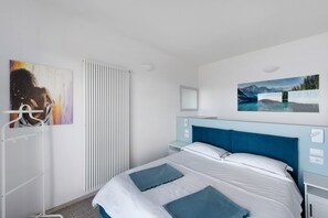 2 dormitorios, tabla de planchar con plancha, wifi gratis y ropa de cama