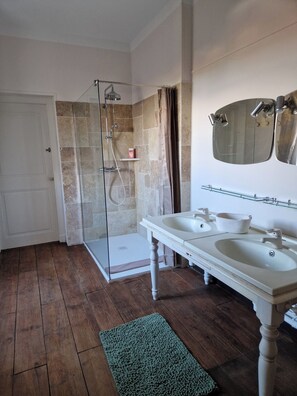Shower, hair dryer, towels, soap