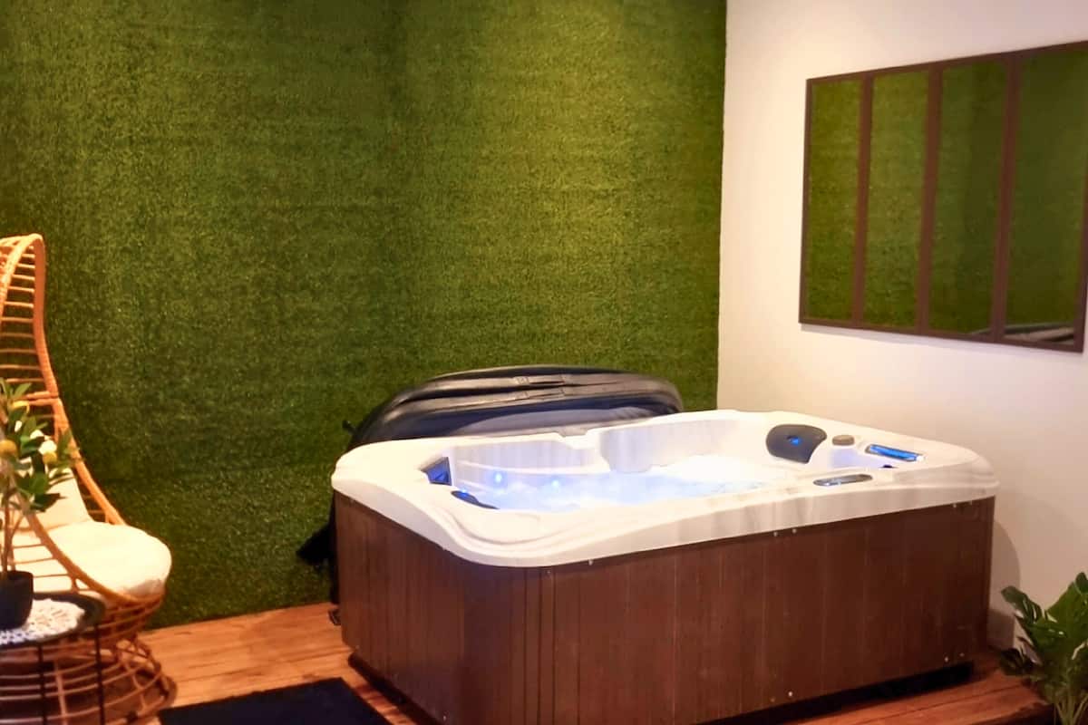 The Jk Experience Spa | Área de sala de estar | Smart TV, Netflix, juguetes y servicios de streaming