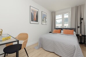 2 chambres, fer et planche à repasser, Wi-Fi, draps fournis