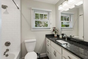 Bathtub, hair dryer, towels