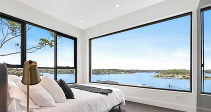 Luxury Waterside Sanctuary with pool, sensational views, 2 decks & lift!