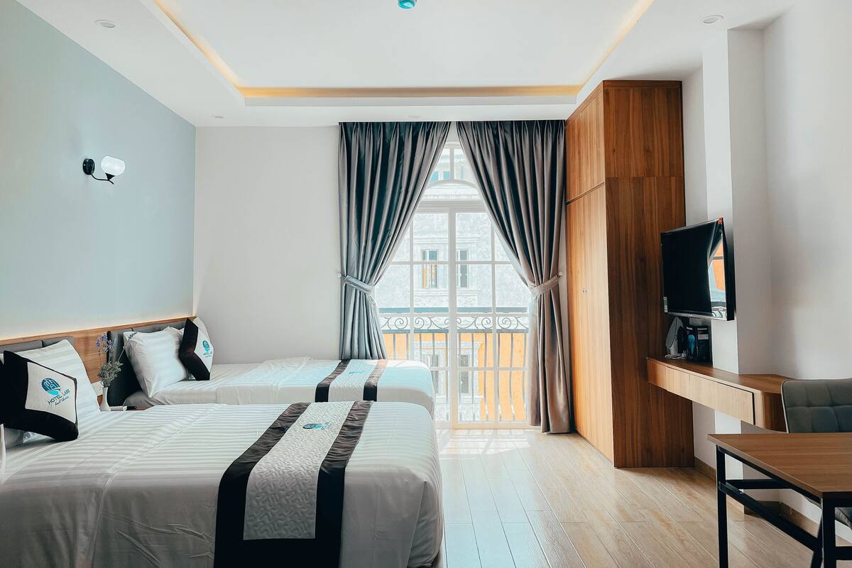 Deluxe studio (206-306-406-506) | Luxe beddengoed, een minibar, een laptopwerkplek