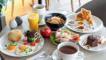 Daily buffet breakfast (EUR 21 per person)