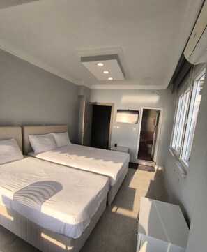 ファミリー ルーム | 2 室のベッドルーム、WiFi (無料)、ベッドシーツ