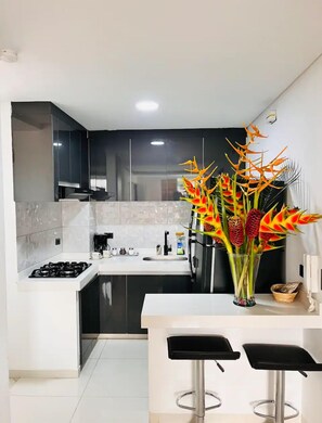 Fridge, microwave, coffee/tea maker, electric kettle