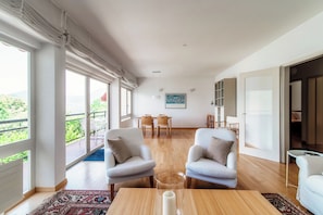 Apartamento Deluxe | Zona de estar