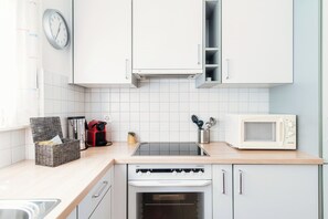 Apartamento Deluxe | Cocina privada | Hervidor eléctrico