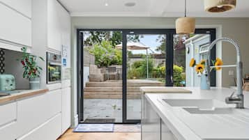 House, Multiple Beds | Private kitchen | Fridge, microwave, oven, stovetop