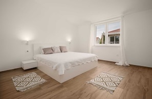 Apartamento, várias camas | 3 quartos, ferros/tábuas de passar roupa, Wi-Fi de cortesia