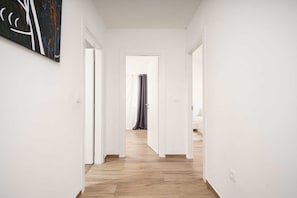 Apartamento, várias camas | Parte interna