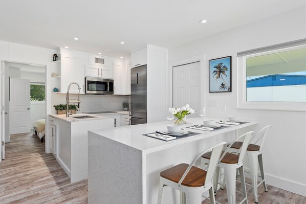 Fridge, microwave, oven, stovetop - Location & Comfort- Coastal Meets Contemporary (Vero Beach)