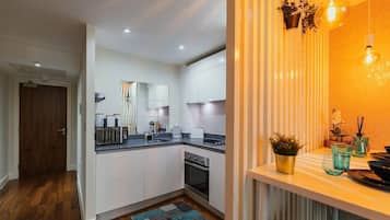 Apartment | Private kitchen | Fridge, oven, stovetop, dishwasher