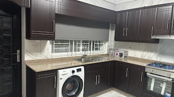Apartment | Private kitchen | Fridge, microwave, oven, stovetop