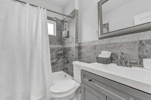 Hair dryer, towels, soap, shampoo