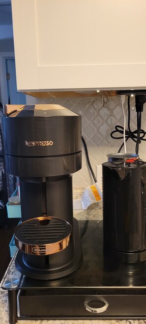 Enjoy a freshly brewed cup from the in-room coffee machine with grinder.