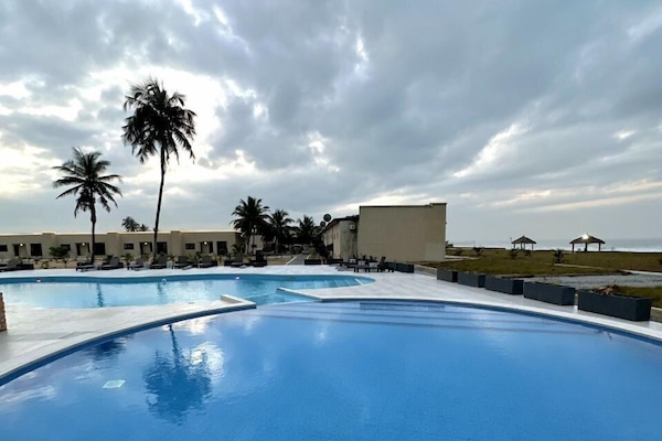 Outdoor pool, pool umbrellas, pool loungers