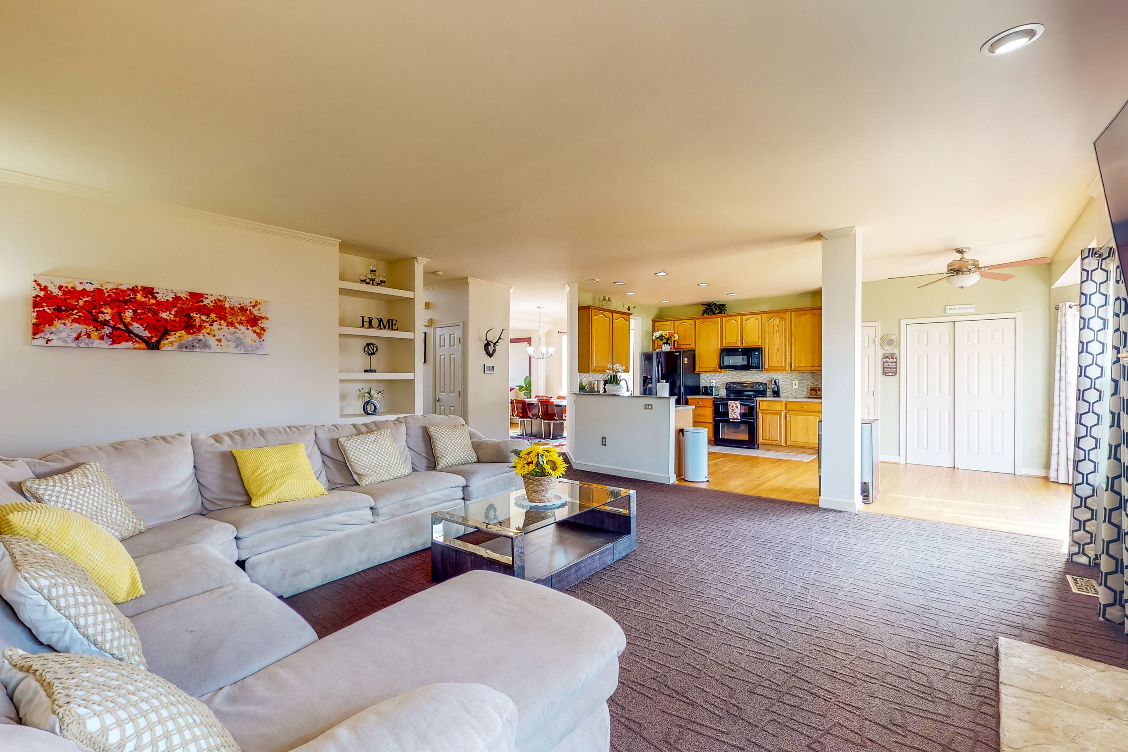 Spacious home with enclosed yard, deck, children's items, full kitchen, & W/D