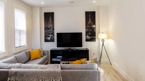 Smart TV, fireplace, books