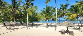 A dreamy vacation apartment, steps from private beach.