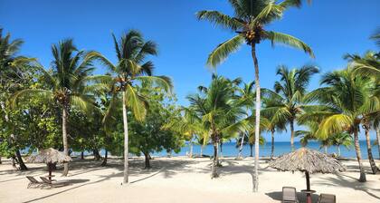 A dreamy vacation apartment, steps from private beach.