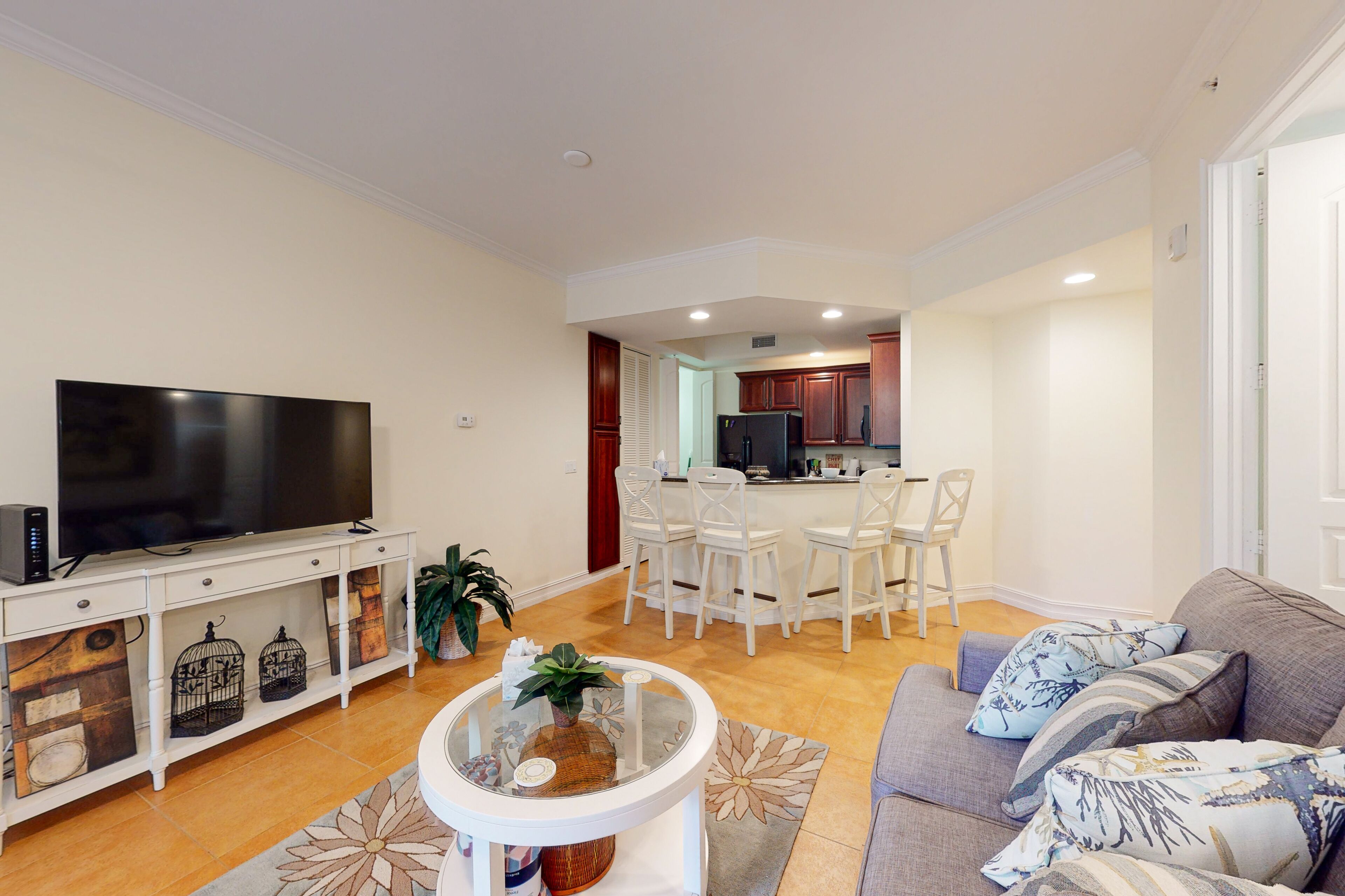 Inviting condo with lanai, wet bar, office, & AC  - walk to shops & dining